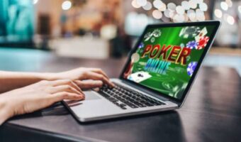 A person plays free poker online on a laptop