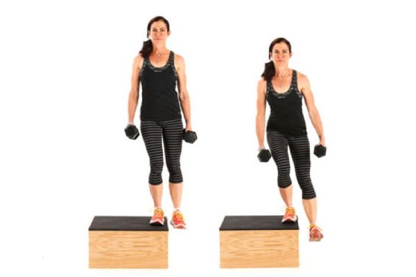 A person performs the exercise side step on the bench to build the inner side of the thighs