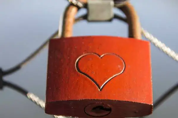 A padlock on the fence in memory of eternal love