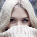 Girl with blond hair color and light blue eyes